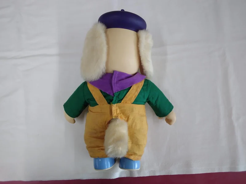 Peluche Takara en vinyle souple vert et gras