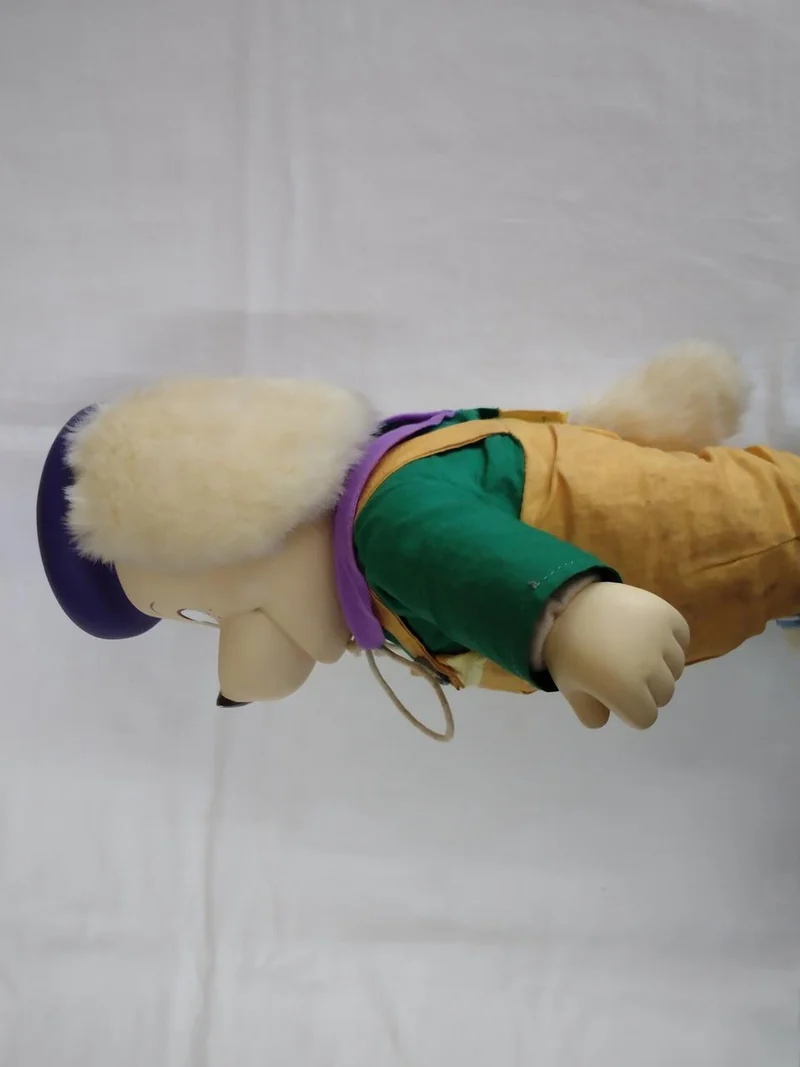 Peluche Takara en vinyle souple vert et gras