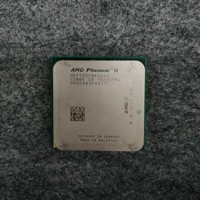[À DÉCHETER] Processeur AMD Phenom II HDT90ZFBK6DGR