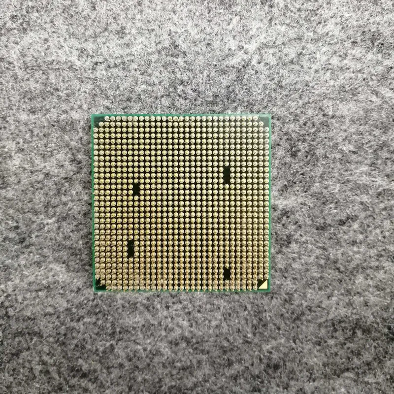[À DÉCHETER] Processeur AMD Phenom II HDT90ZFBK6DGR