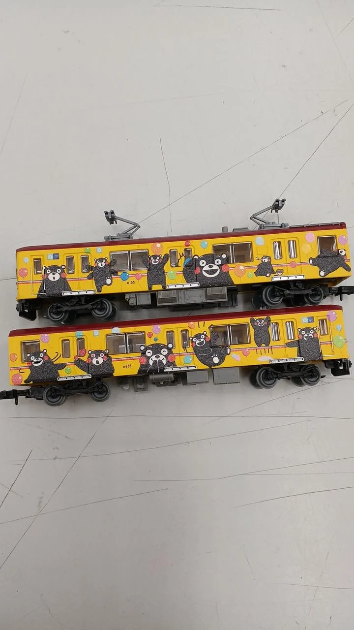 Coffret de 2 wagons jaunes Kumamon de la série 01 de TOMYTEC Model Train Kumamoto Electric Railway