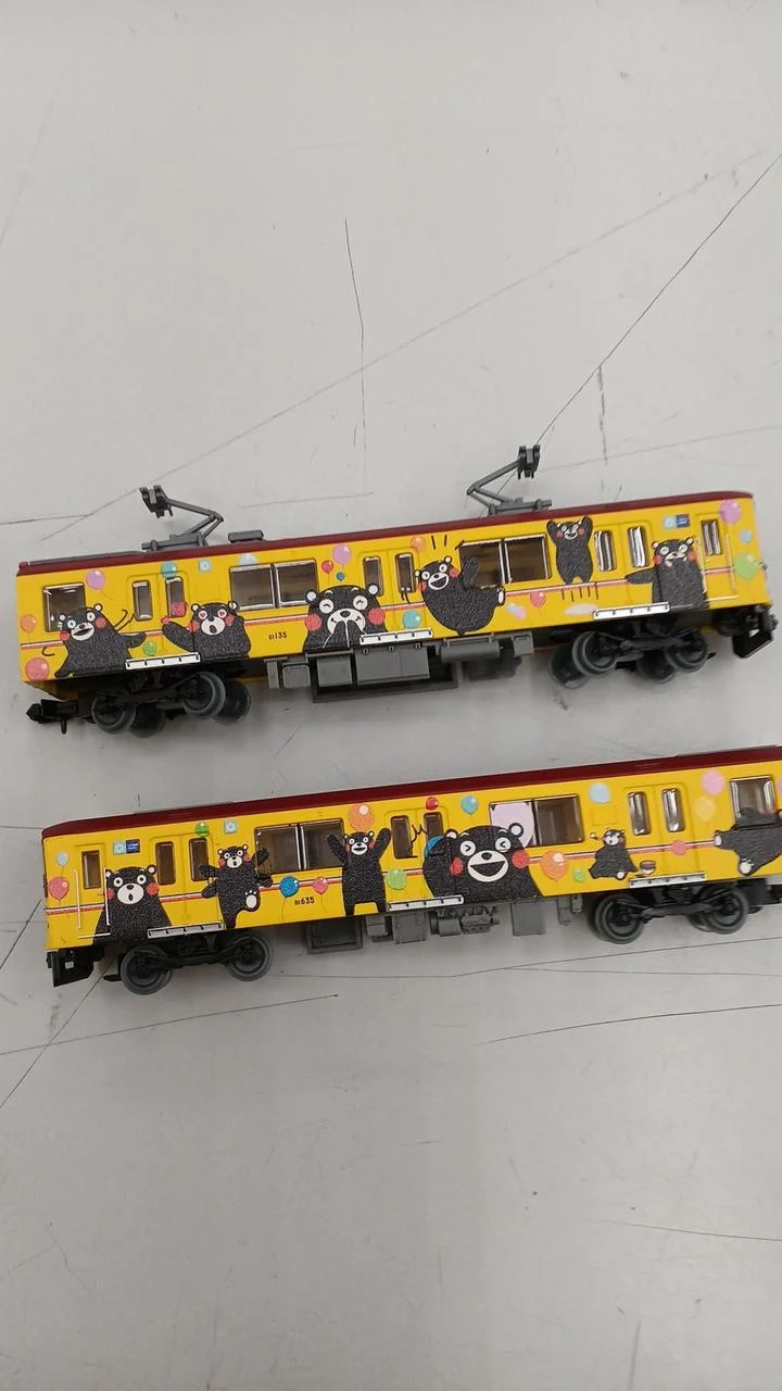Coffret de 2 wagons jaunes Kumamon de la série 01 de TOMYTEC Model Train Kumamoto Electric Railway