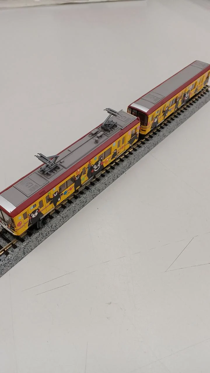Coffret de 2 wagons jaunes Kumamon de la série 01 de TOMYTEC Model Train Kumamoto Electric Railway